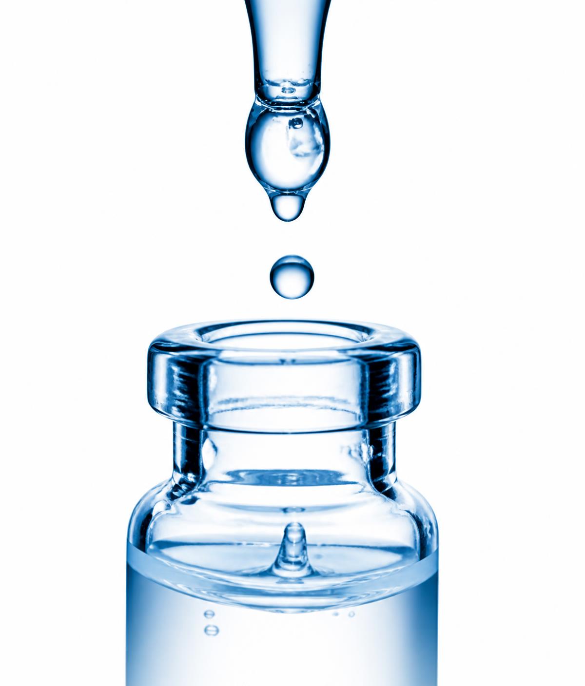 Droplet falling into a sterile research vial